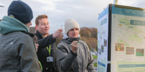 Group of people discussing a design board