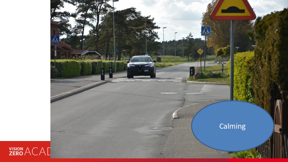 Zebra Crossing being used to calm traffic on approach to a side road. semi rural location. 