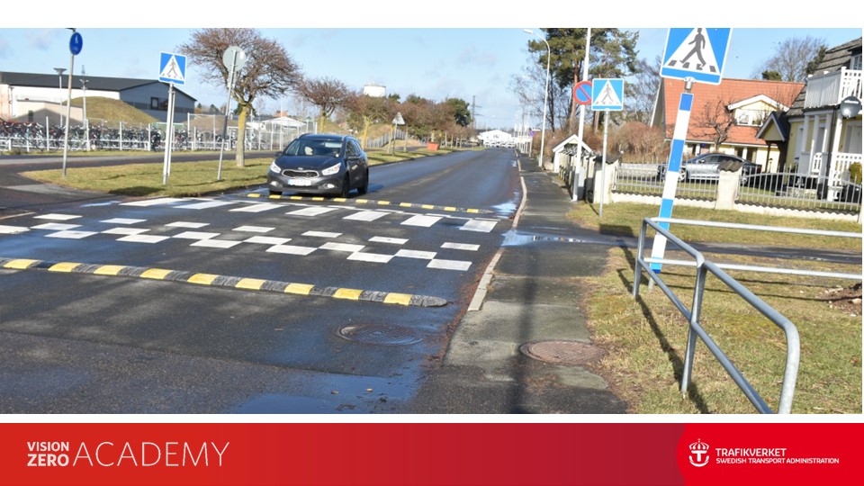 zebra crossing and cycle crossing side by side on residential street