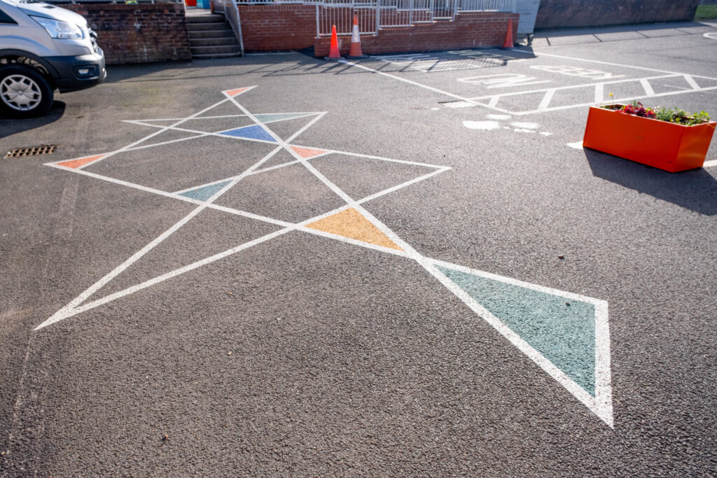 The creative ground markings by Bigg Design and Fun Makes Good are shown.