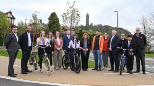 Partners and school pupils celebrate the opening of Walk Cycle Live Stirling
