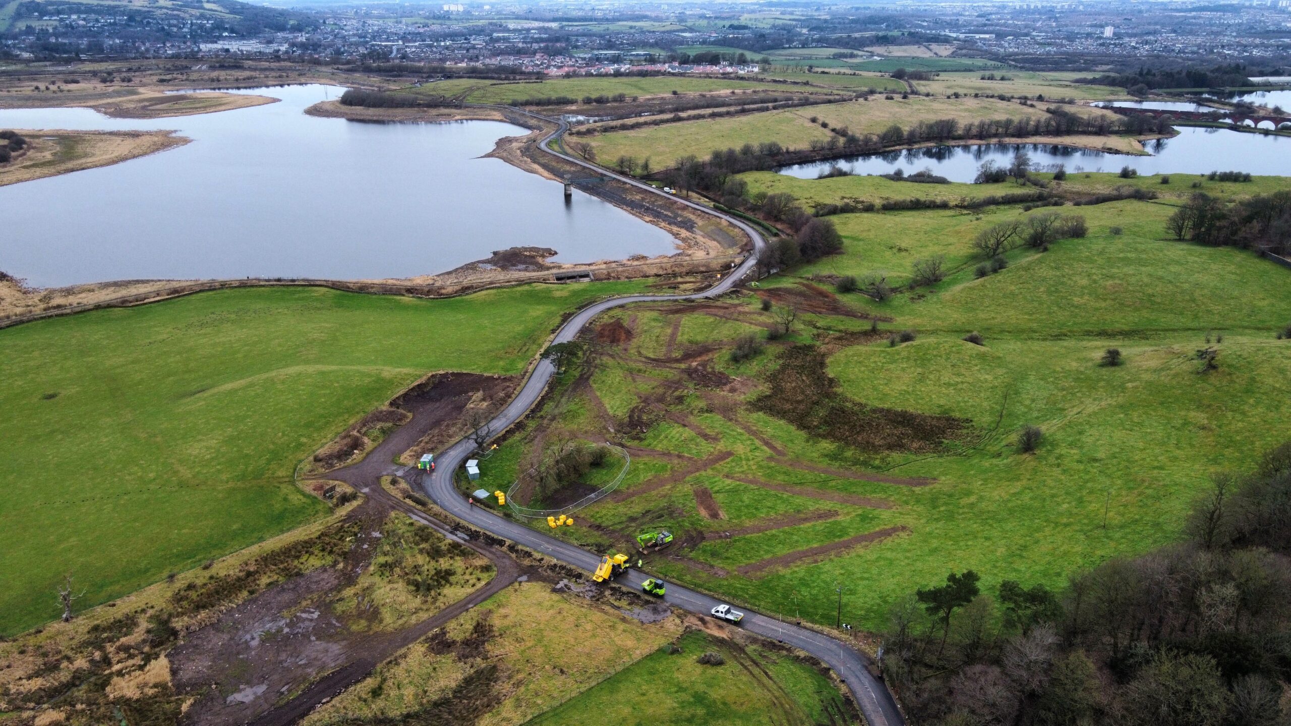 Reservoir in a rural setting alongside a road
©2024 East Renfrewshire Council